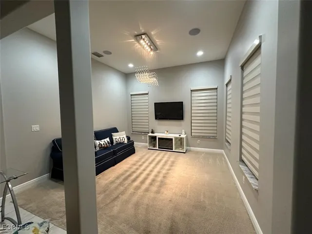 a view of a livingroom with a flat screen tv