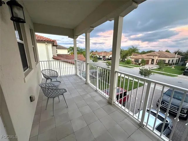 a balcony with wooden floor view