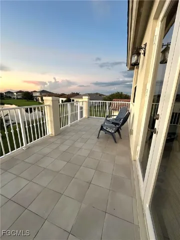 a view of a terrace with chairs