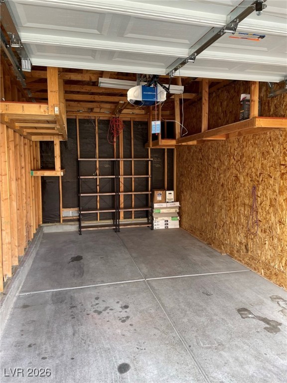 700 Carnegie Street, Unit 4112 Henderson, NV 89052 - Photo 18 of 21 Garage featuring a garage door opener
