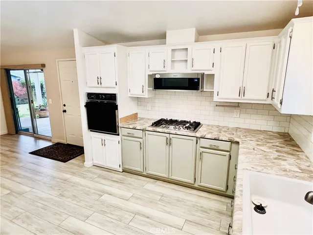 a house view with a garden space