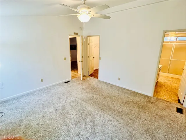 a bathroom with a tub sink and shower