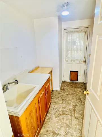 a bathroom with a sink a mirror and a shower