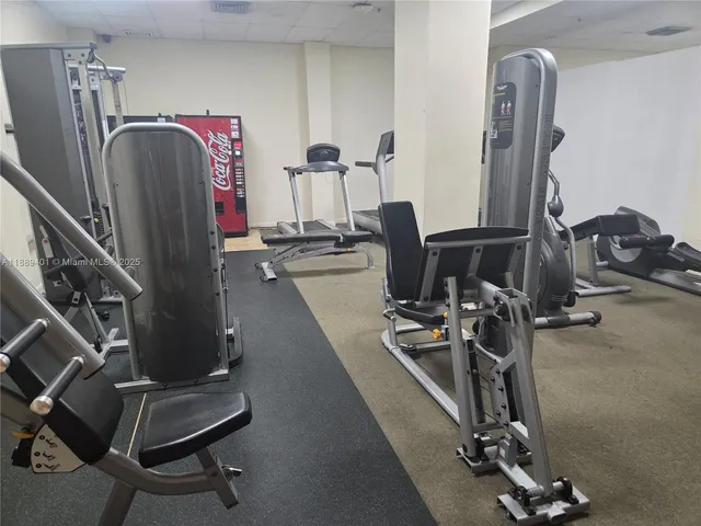 a view of a workspace with furniture