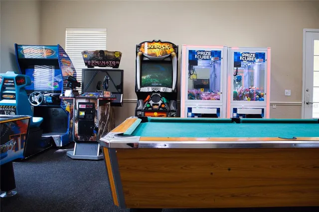 a room with toys and a flat screen tv