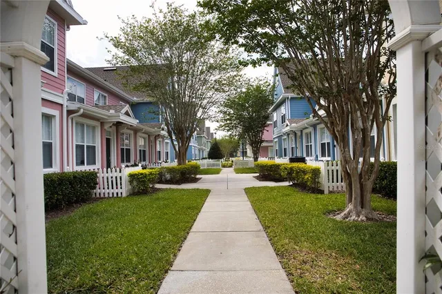 a front view of a house with garden and porch