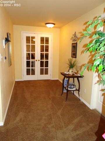 12570 Old Barn Road Elbert, CO 80106 - Photo 12 of 25 French Doors Leading To Family Room