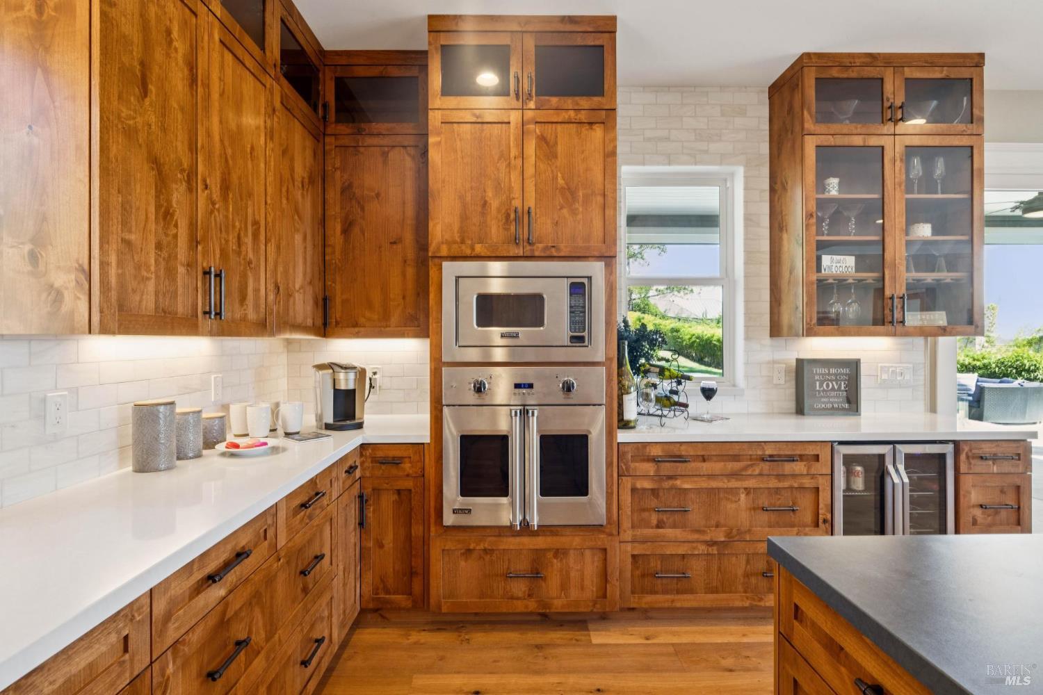 3882 Royal Manor Place Santa Rosa, CA 95404 - Photo 23 of 98 This beautiful electric convection Viking oven to perfect your baking and make a grand total of 3 ovens. Making holiday cooking or large gathering a breeze. There is also a built in Viking microwave above the over and a wine/beverage refrigerator pictured here.