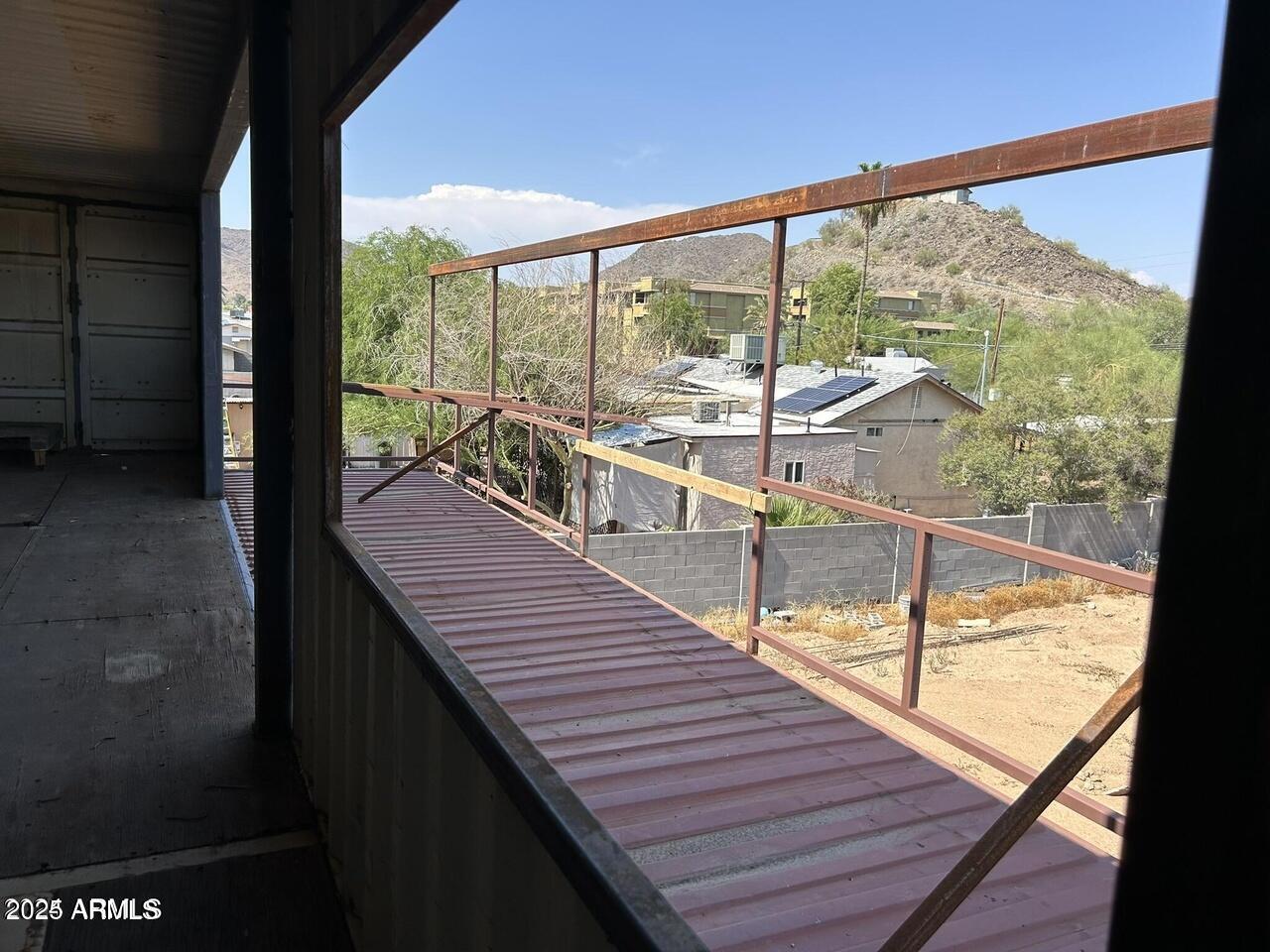 9428 North 9th Avenue Phoenix, AZ 85021 - Photo 9 of 18 a view of two chairs in the balcony