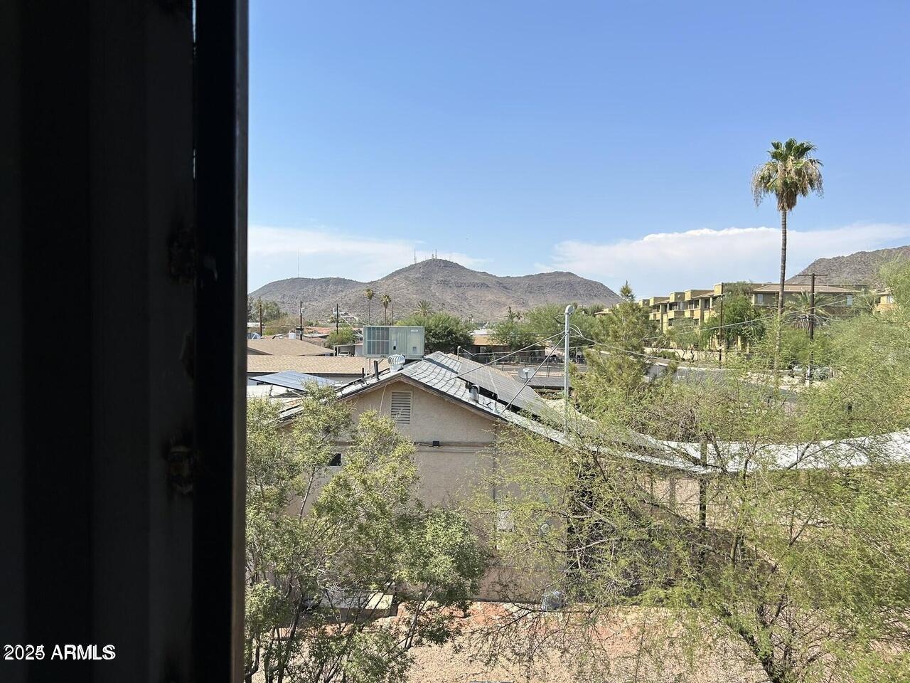 9428 North 9th Avenue Phoenix, AZ 85021 - Photo 10 of 18 a view of a lake from a mountain view