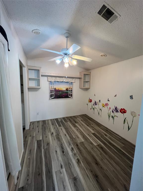 13891 Southeast 126th Boulevard, Unit 121 Okeechobee, FL 34974 - Photo 11 of 45 a view of a livingroom with wooden floor