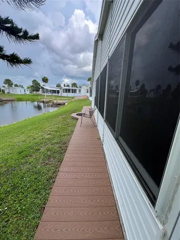 a view of swimming pool from a balcony