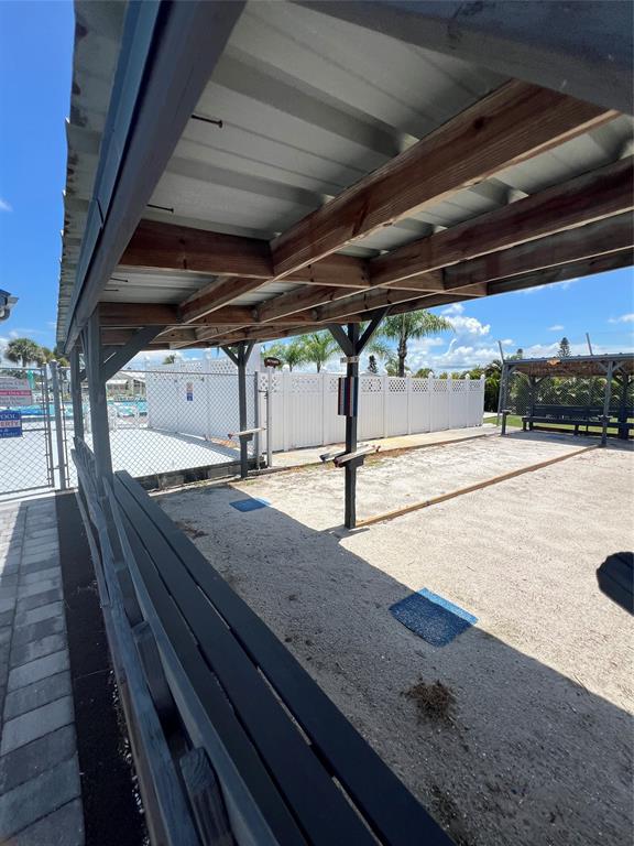 13891 Southeast 126th Boulevard, Unit 121 Okeechobee, FL 34974 - Photo 35 of 45 a view of a air conditioner
