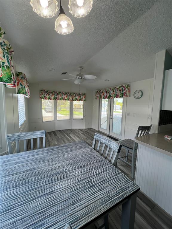 13891 Southeast 126th Boulevard, Unit 121 Okeechobee, FL 34974 - Photo 7 of 45 a living room with furniture