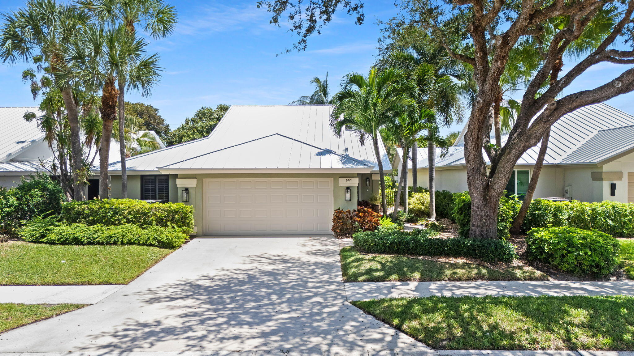 141 Sand Pine Drive Jupiter, FL 33477 - Photo 2 of 47 1-web-or-mls-DJI_20250828130019_0997_D