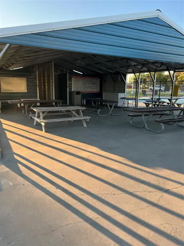 a view of room with gym equipment