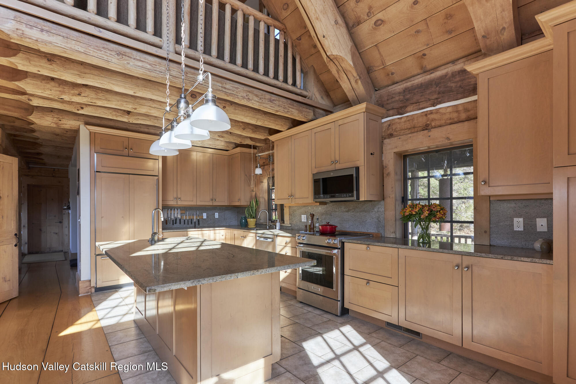 87 Kaye Road Millerton, NY 12546 - Photo 14 of 46 a kitchen with a sink and cabinets