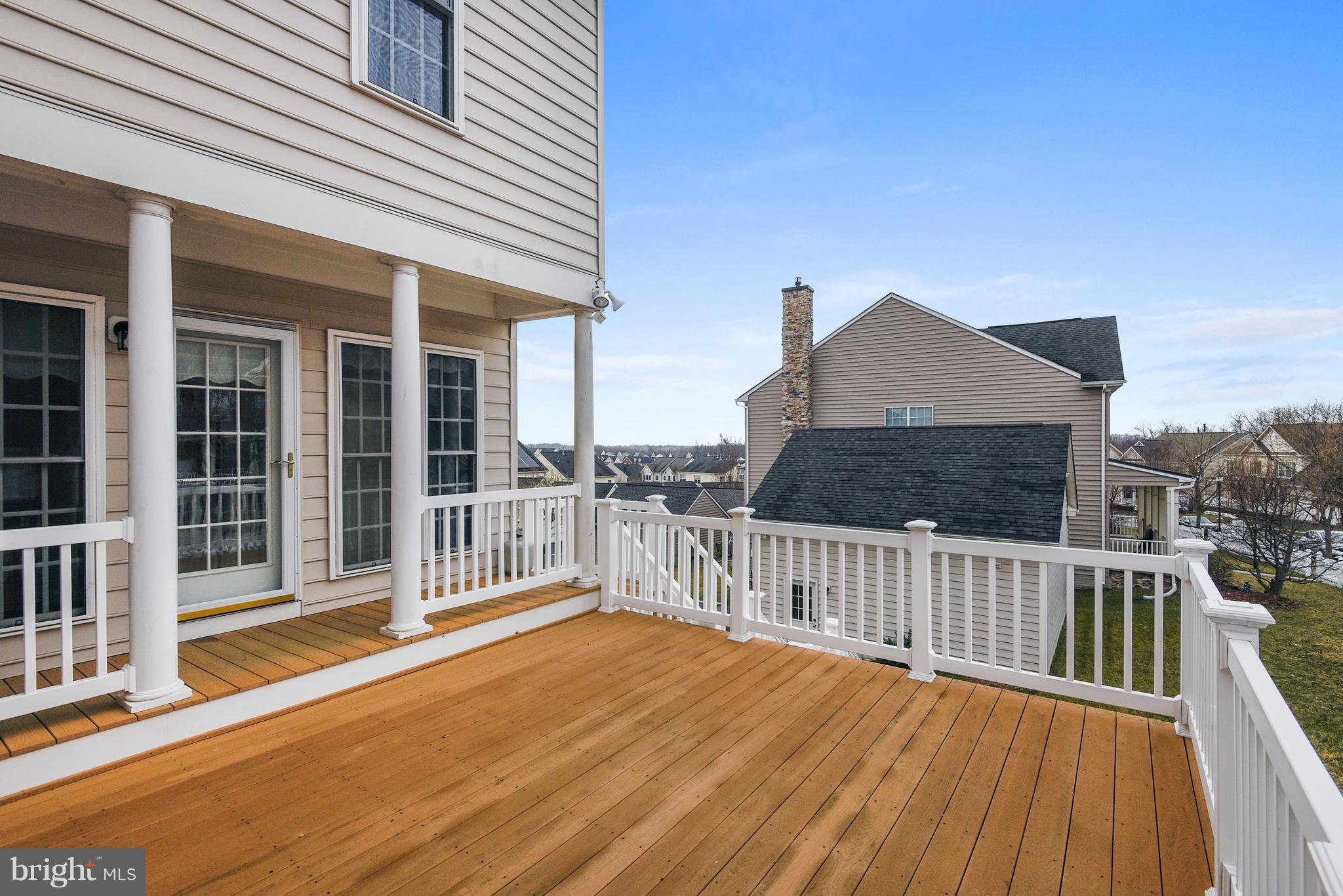 12318 Cypress Spring Road Clarksburg, MD 20871 - Photo 14 of 30 SIDE COVERED PORCH AND DECK WITH STAIRS