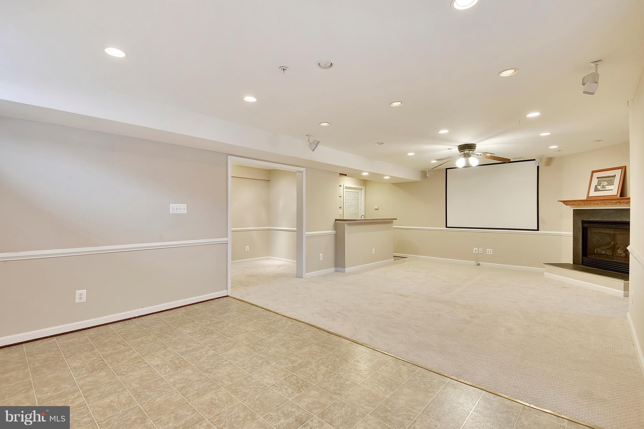 12318 Cypress Spring Road Clarksburg, MD 20871 - Photo 26 of 30 REC RM W/SURROUND SOUND & PROJECTION SCREEN