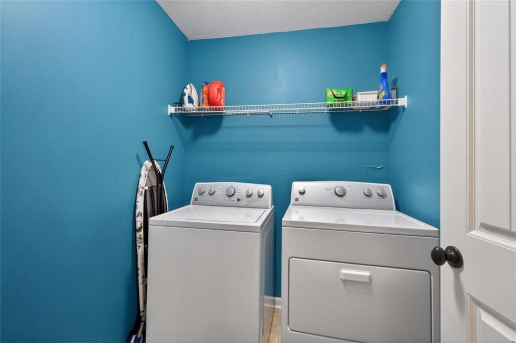 336 Dixie Ct Mount Mount Airy, GA 30563 - Photo 28 of 41 a utility room with dryer and washer