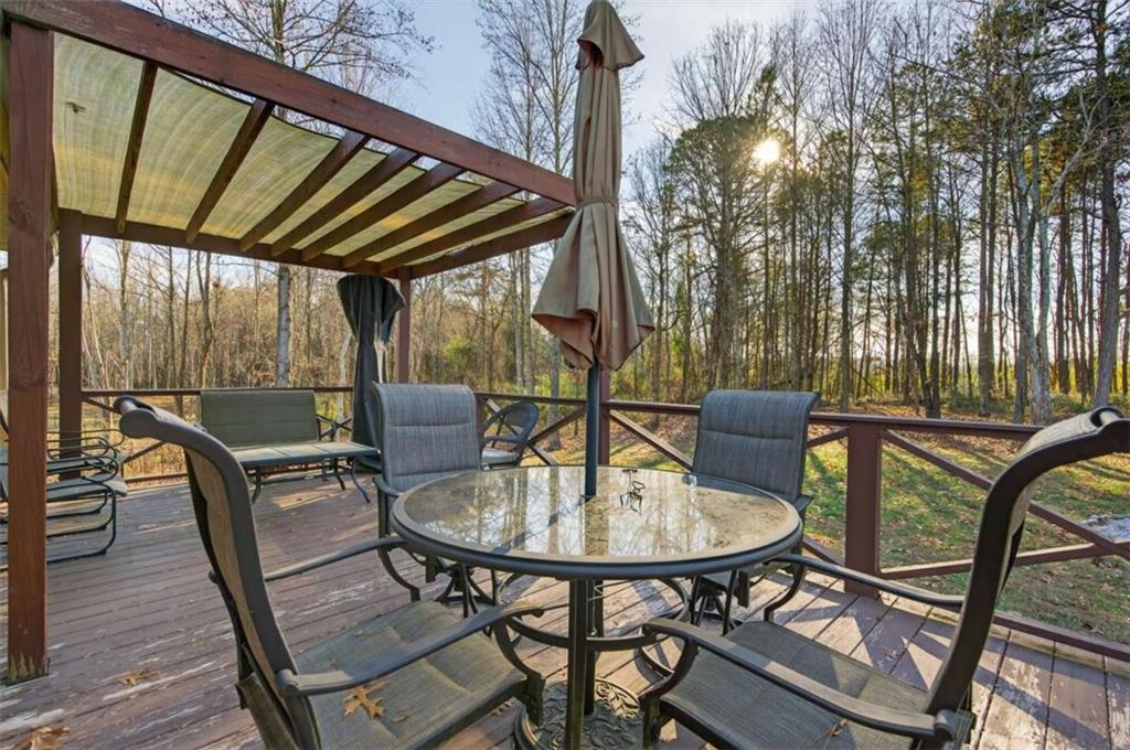 336 Dixie Ct Mount Mount Airy, GA 30563 - Photo 30 of 41 a view of a chairs and table in the patio