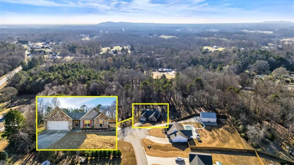 336 Dixie Ct Mount Mount Airy, GA 30563 - Photo 40 of 41 an aerial view of houses with a yard