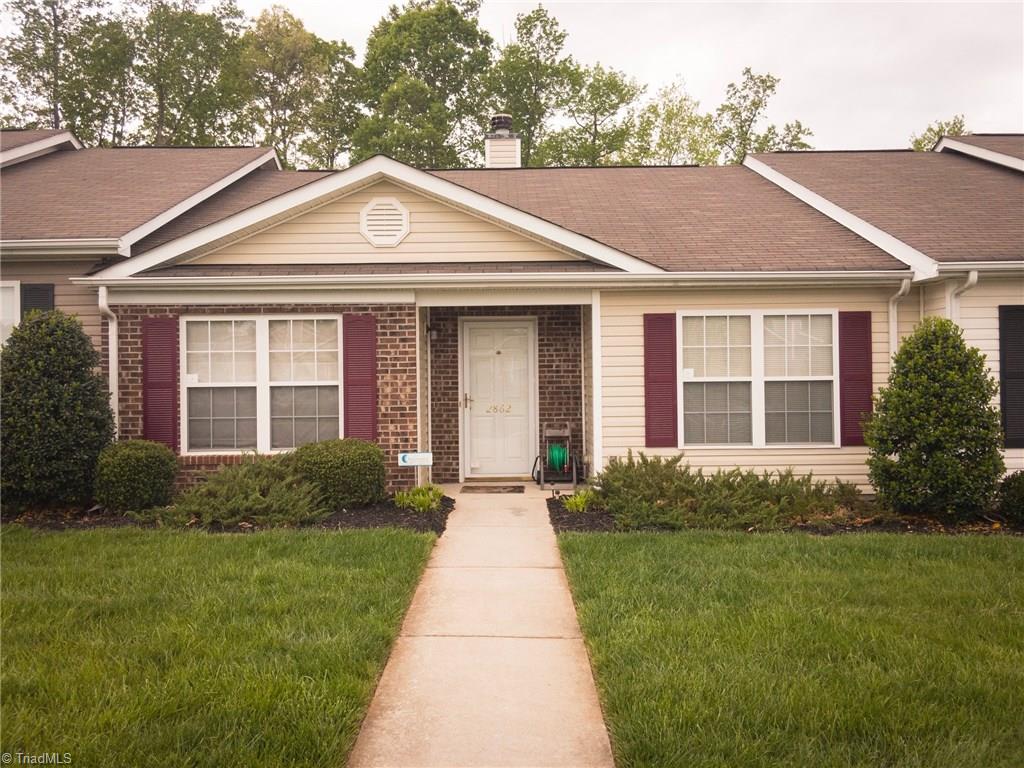2862 WaterStone Loop High Point, NC 27265 - Photo 2 of 14 Pretty landscaping and brick accents.