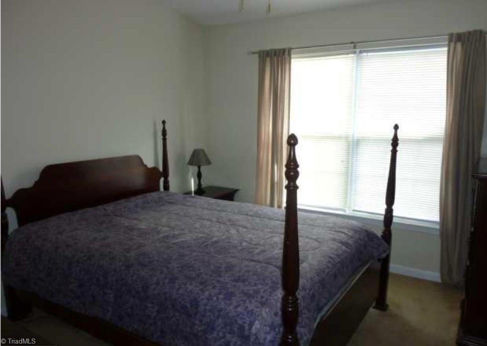 2862 WaterStone Loop High Point, NC 27265 - Photo 14 of 14 Large master bedroom also has vaulted ceiling.