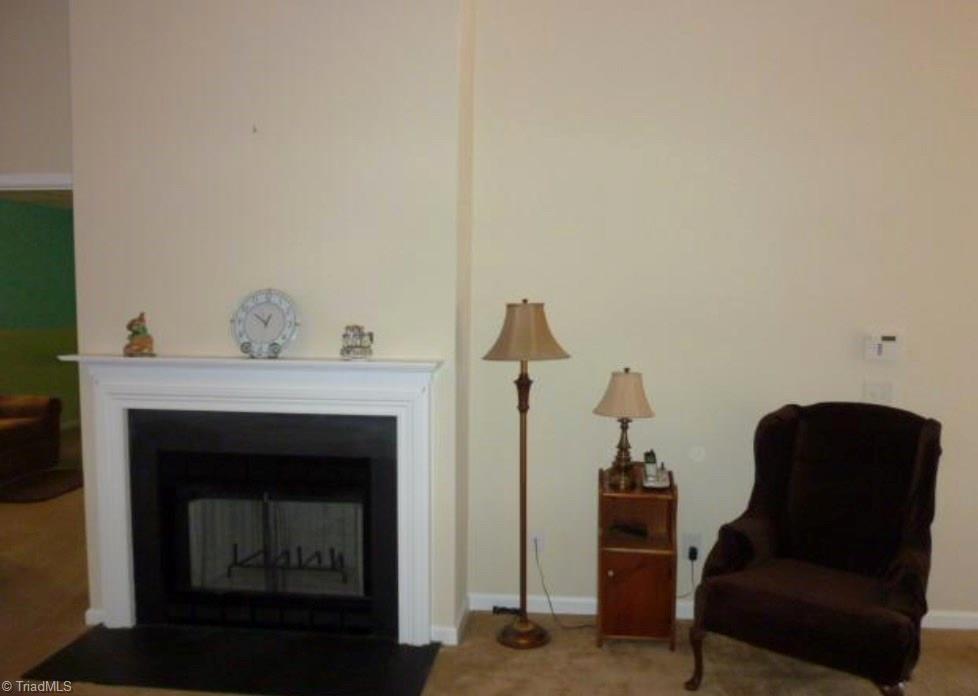 2862 WaterStone Loop High Point, NC 27265 - Photo 8 of 14 Neutral paint in the living room.
