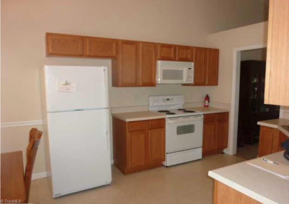 2862 WaterStone Loop High Point, NC 27265 - Photo 10 of 14 Nice sized, eat-in kitchen with white appliances.