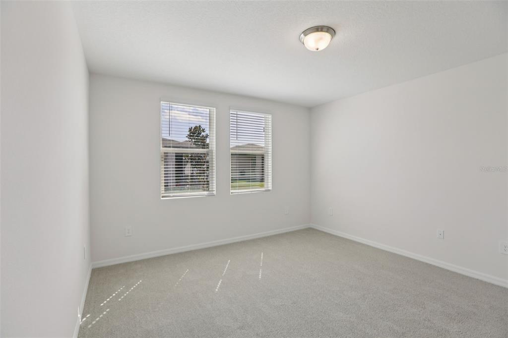 643 Pennywort Street Lake Alfred, FL 33850 - Photo 23 of 47 an empty room with a window