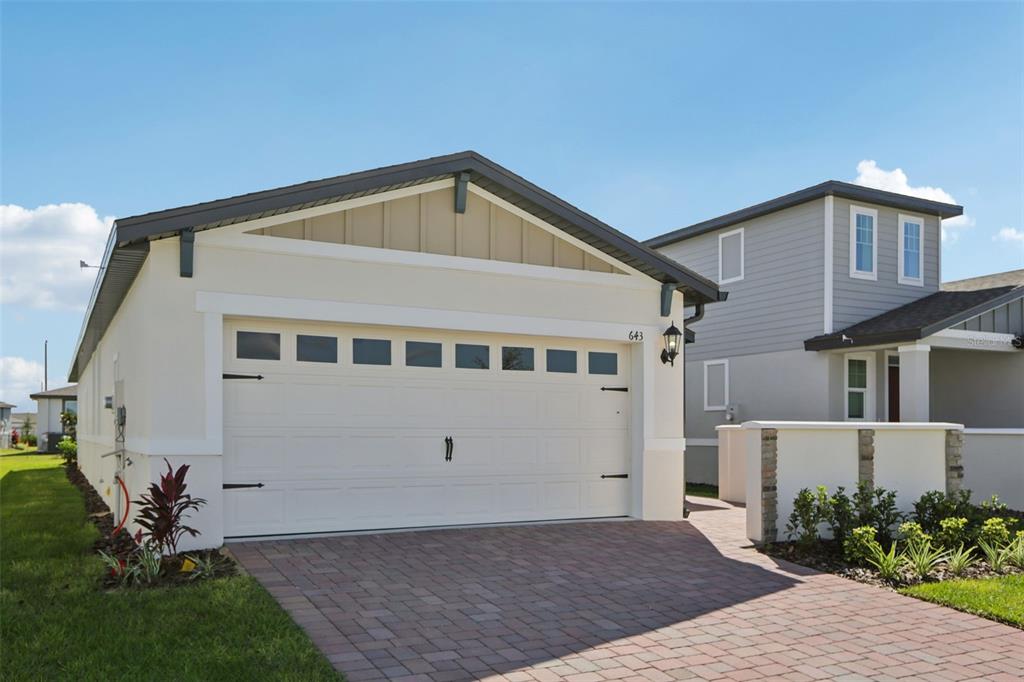 643 Pennywort Street Lake Alfred, FL 33850 - Photo 3 of 47 a view of a house with a yard