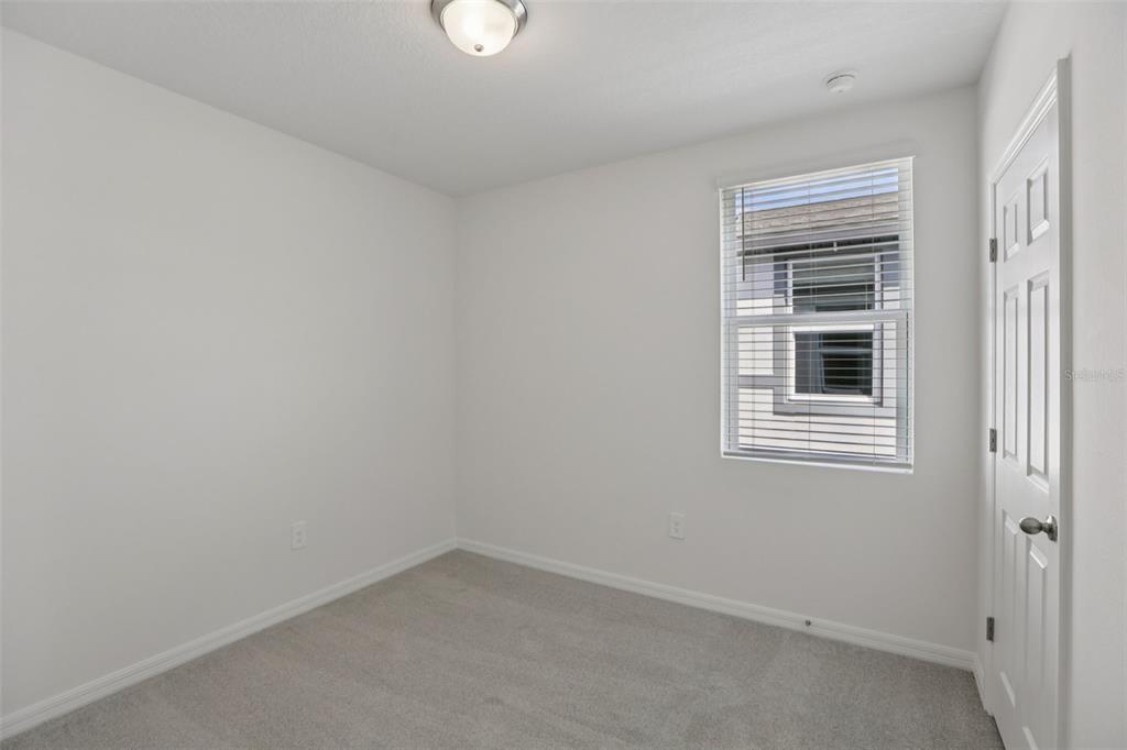 643 Pennywort Street Lake Alfred, FL 33850 - Photo 36 of 47 a room that has a window in it