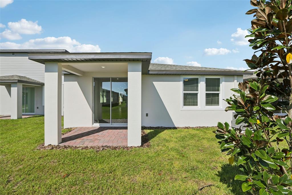643 Pennywort Street Lake Alfred, FL 33850 - Photo 43 of 47 a view of a house with a yard