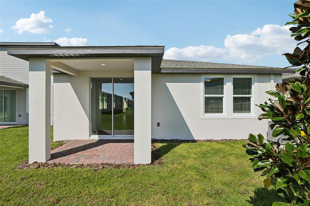643 Pennywort Street Lake Alfred, FL 33850 - Photo 44 of 47 a view of front door and yard