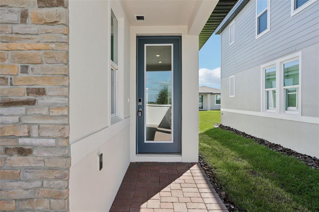 643 Pennywort Street Lake Alfred, FL 33850 - Photo 7 of 47 a view of a front door of the house