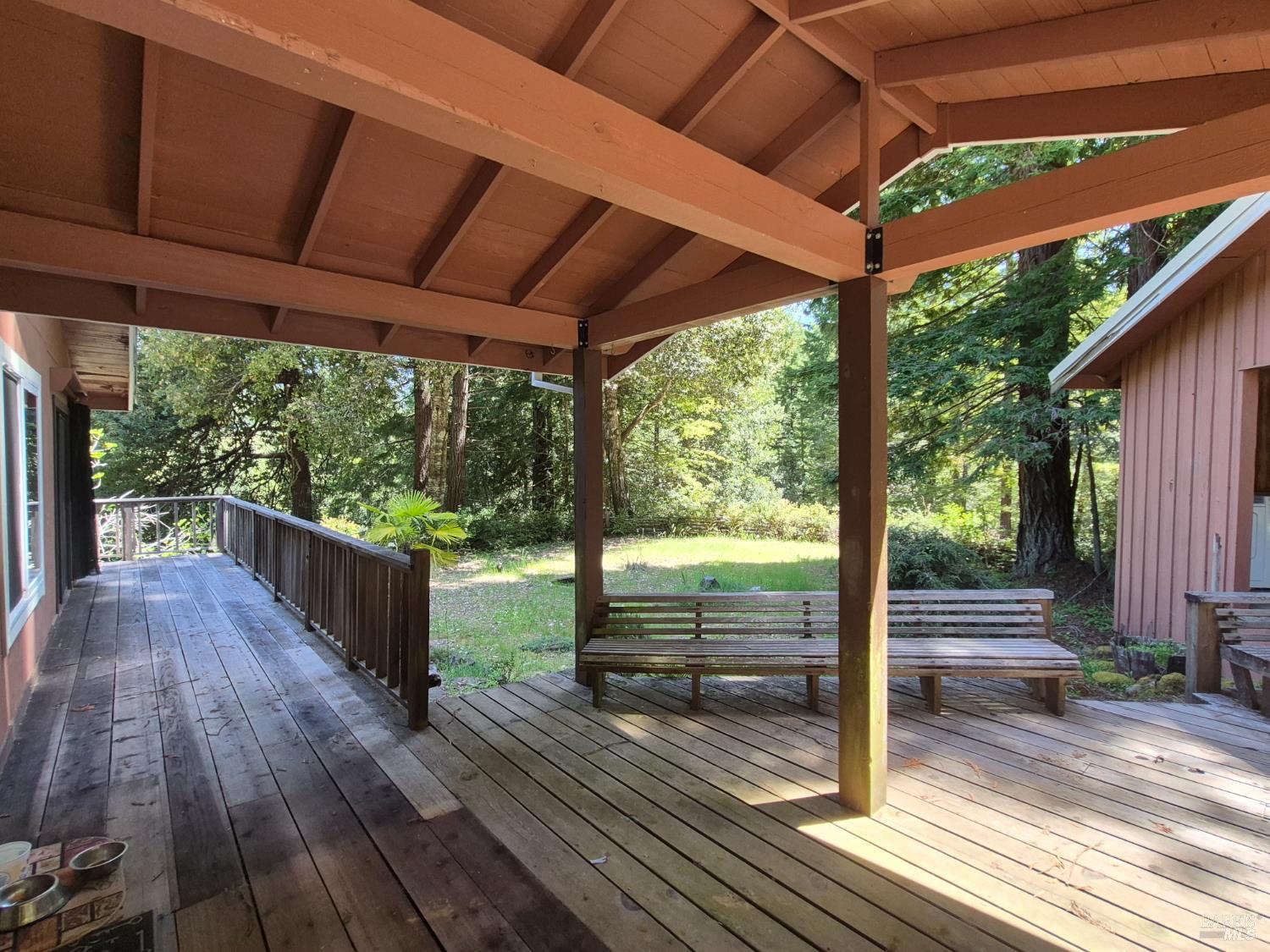 11903 Branscomb Road Laytonville, CA 95454 - Photo 13 of 72 a view of porch with wooden floor
