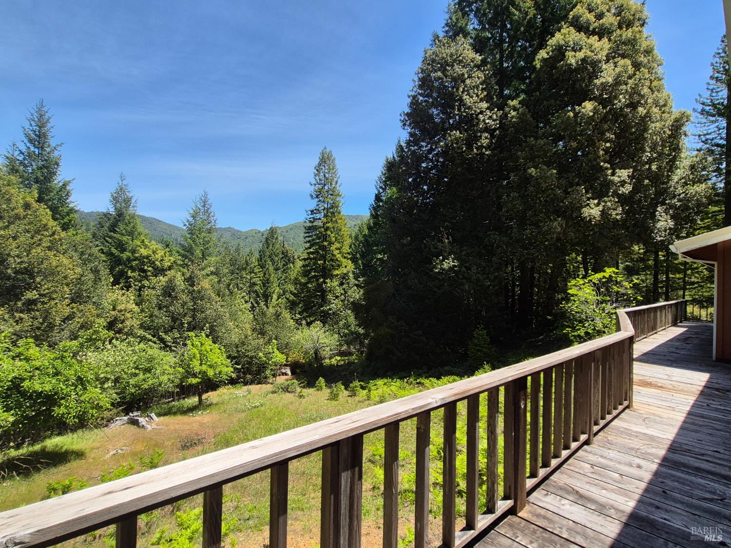 11903 Branscomb Road Laytonville, CA 95454 - Photo 19 of 72 a balcony with an outdoor space