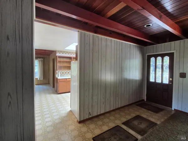 a view of a balcony with wooden fence