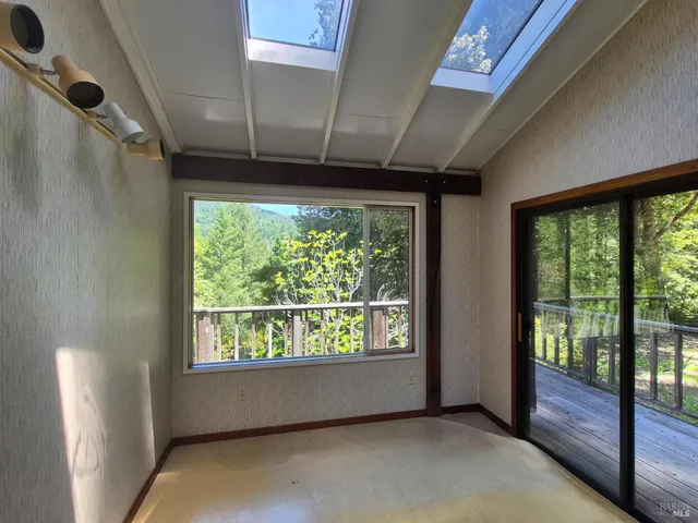 a backyard of a house with lots of green space