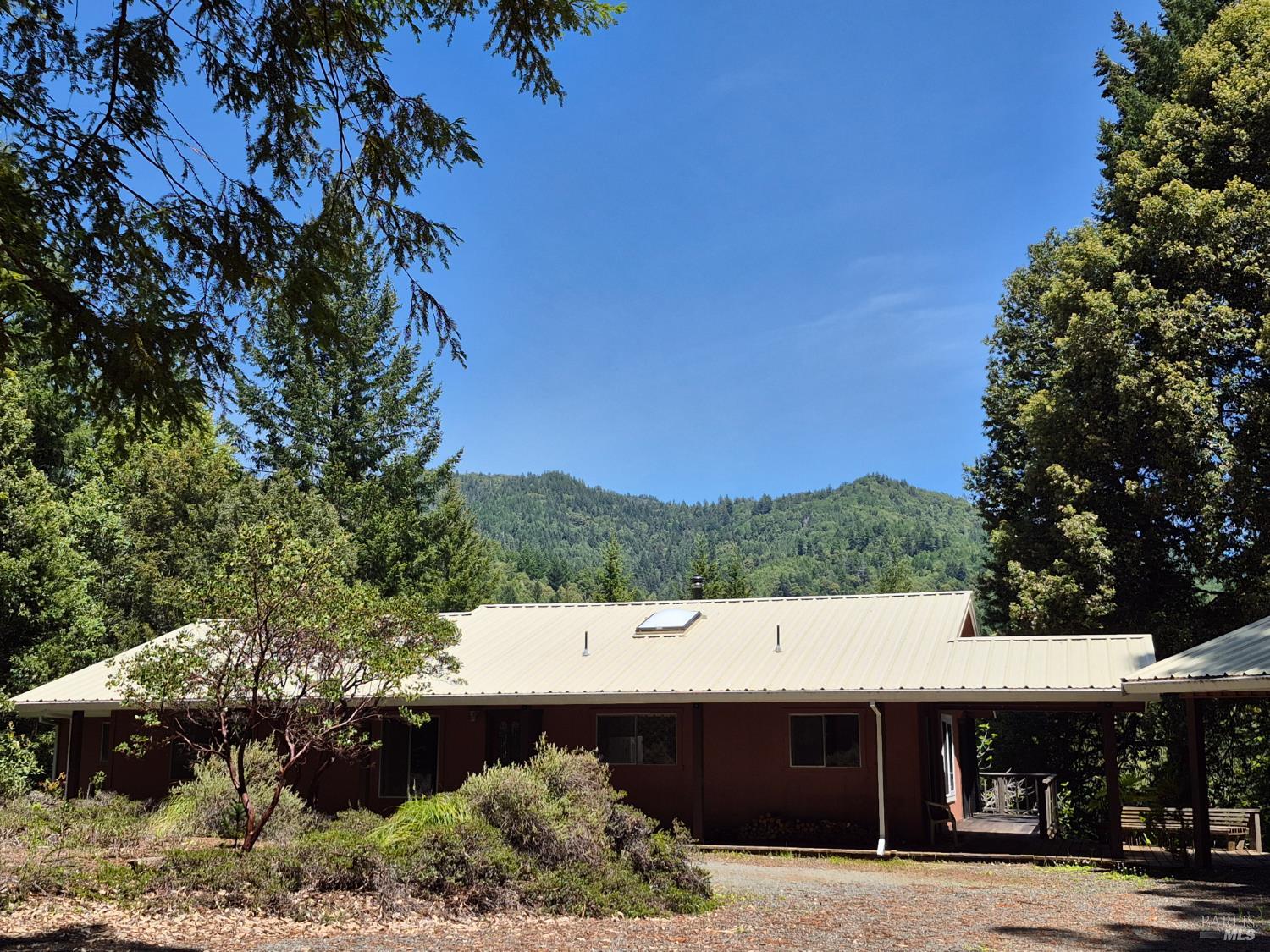 11903 Branscomb Road Laytonville, CA 95454 - Photo 5 of 72 a view of a house with a yard
