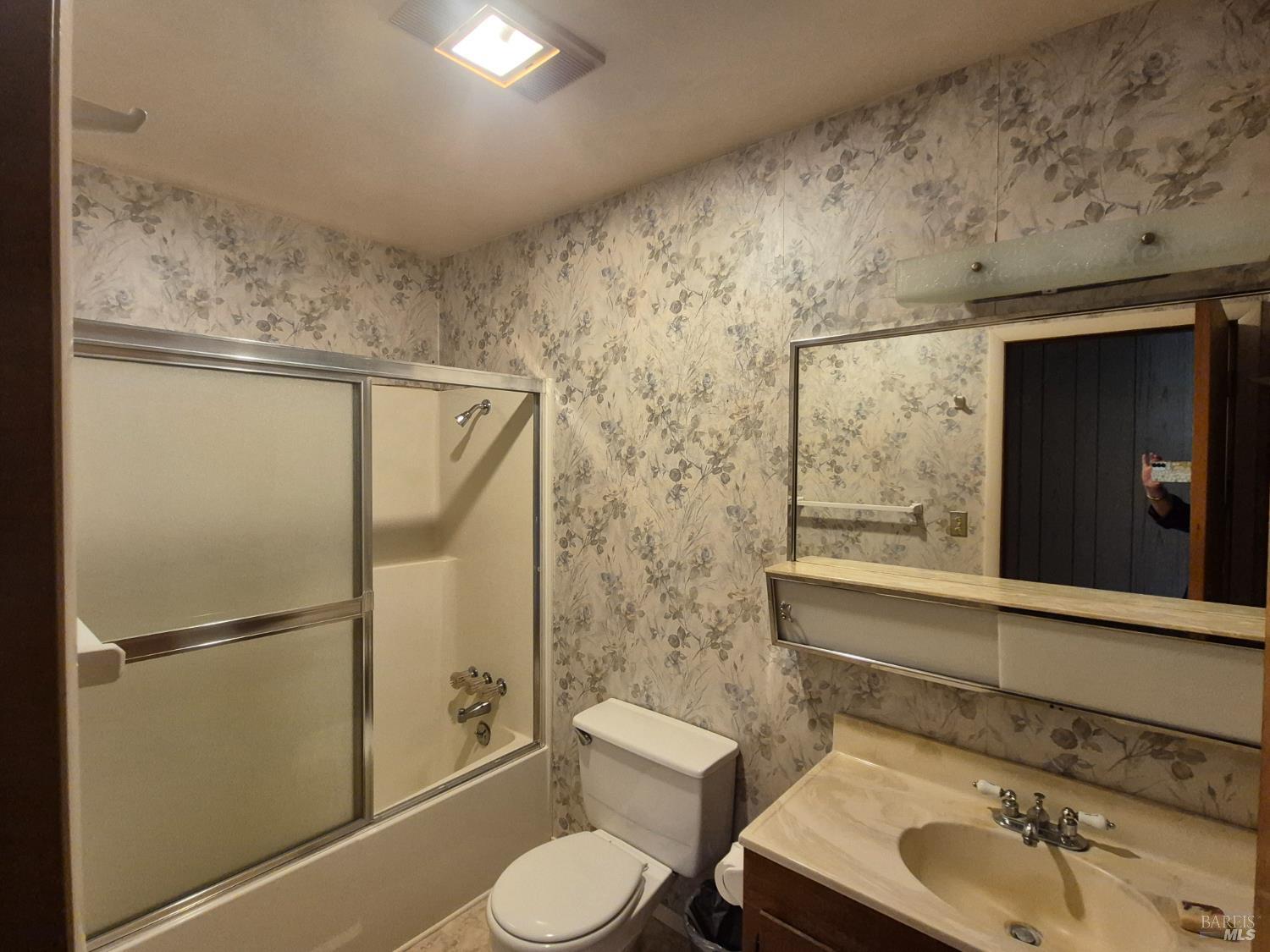 11903 Branscomb Road Laytonville, CA 95454 - Photo 59 of 72 a bathroom with a sink toilet and shower