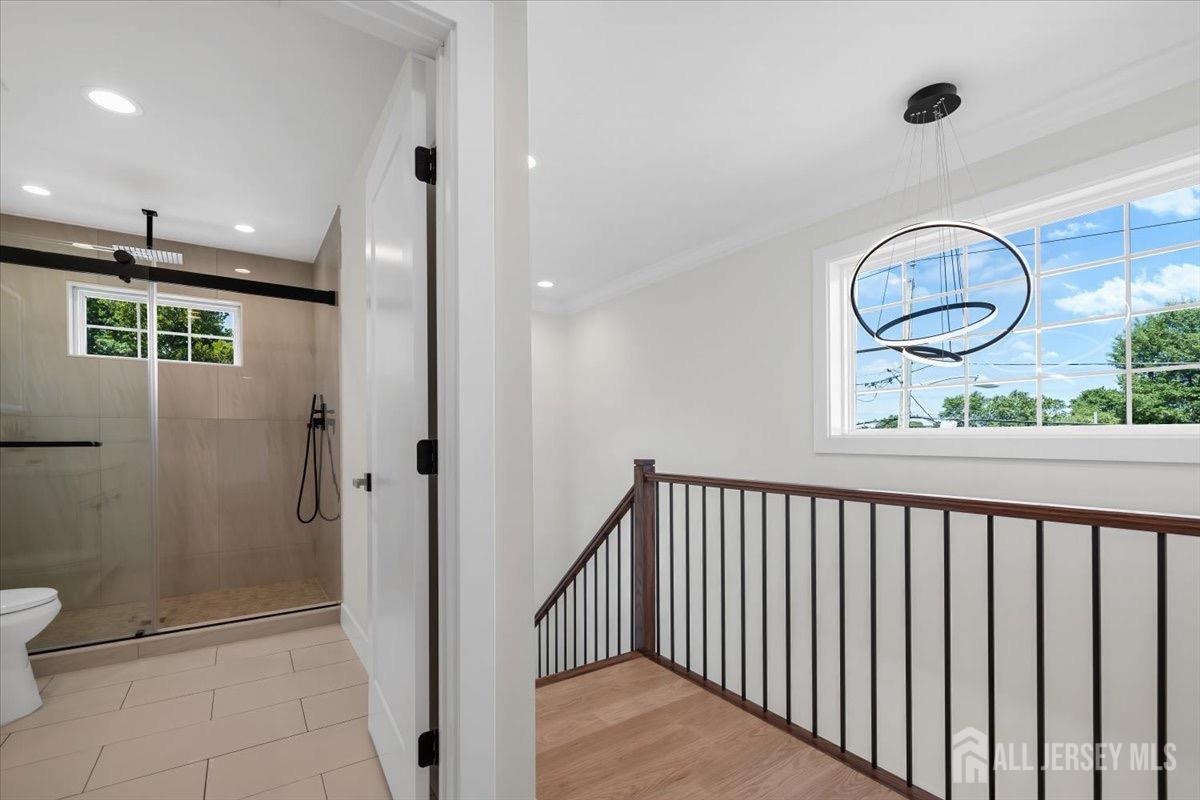 30 Ashley Road Edison, NJ 08817 - Photo 14 of 39 a view of a hallway with wooden floor