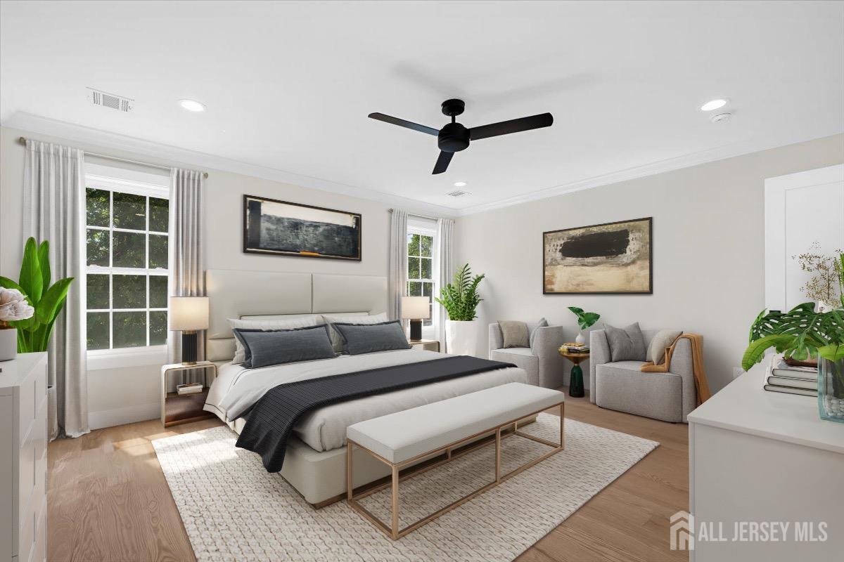 30 Ashley Road Edison, NJ 08817 - Photo 17 of 39 a bedroom with a bed a couch and a potted plant