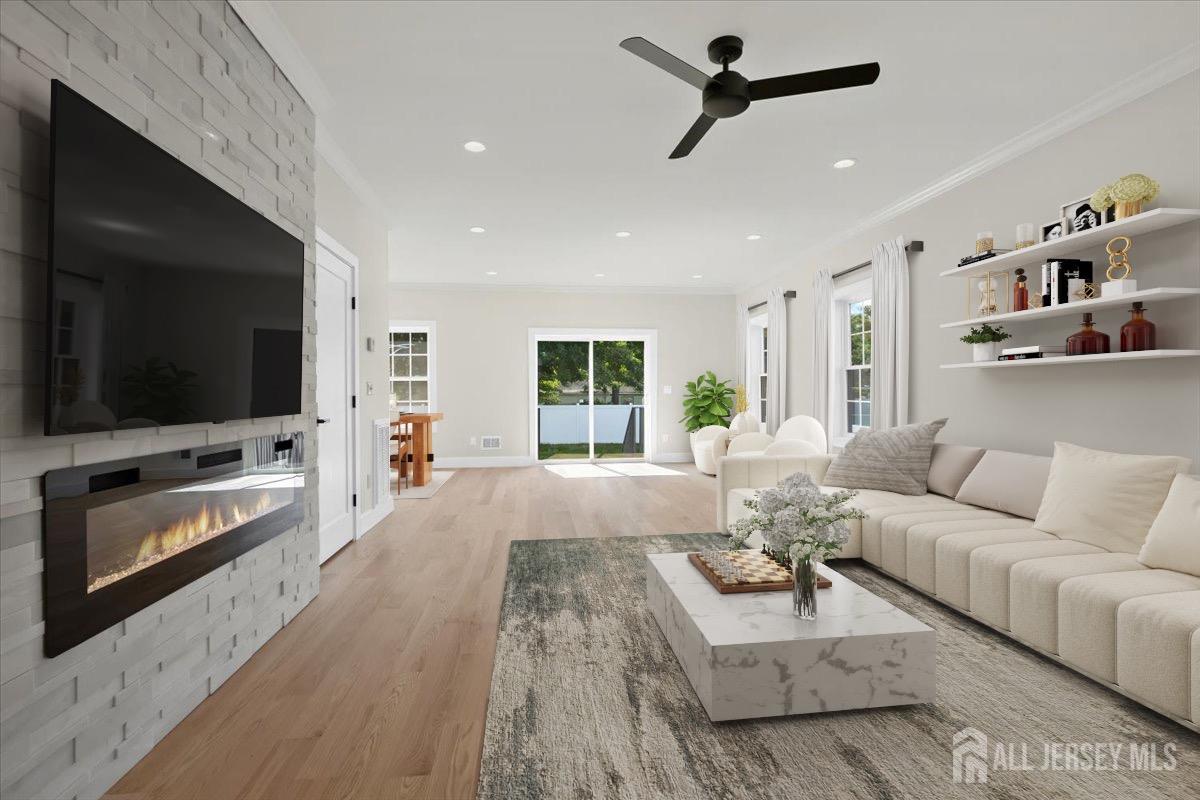 30 Ashley Road Edison, NJ 08817 - Photo 2 of 39 a living room with furniture and a flat screen tv