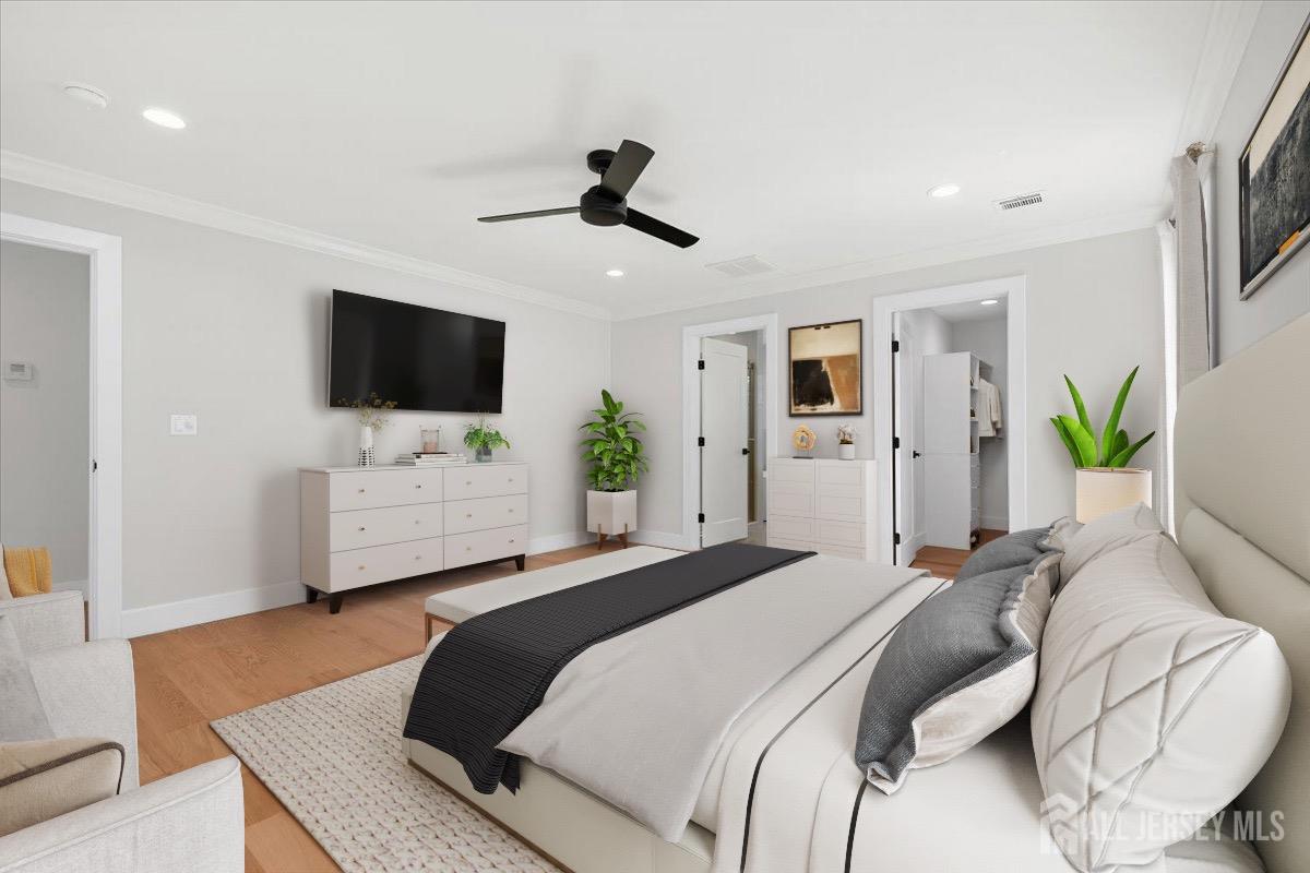 30 Ashley Road Edison, NJ 08817 - Photo 22 of 39 a bedroom with a bed window and flat screen tv