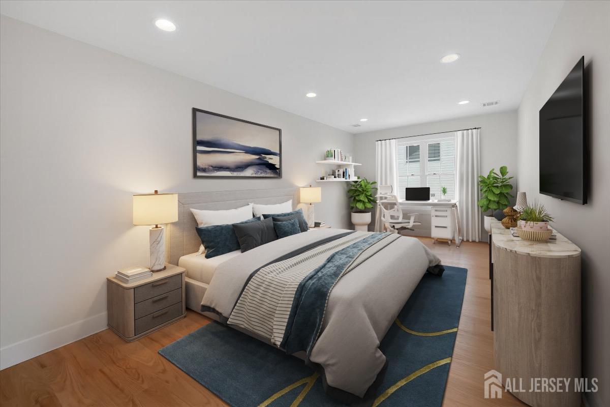 30 Ashley Road Edison, NJ 08817 - Photo 23 of 39 a spacious bedroom with a bed and a flat screen tv