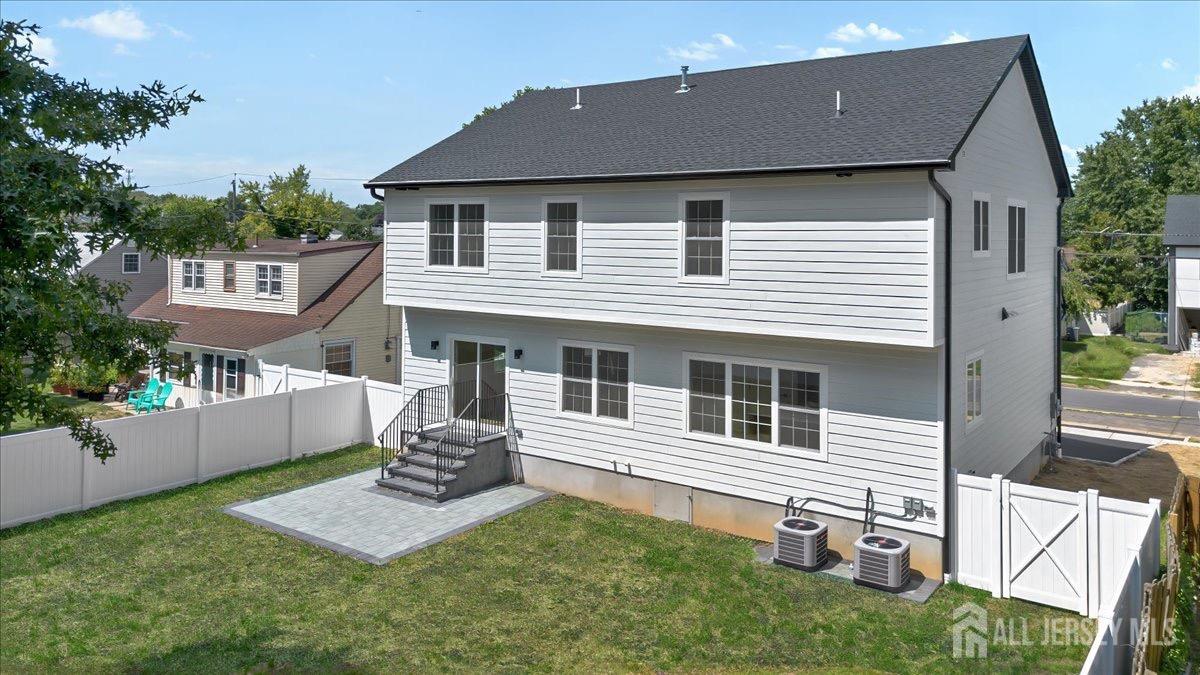 30 Ashley Road Edison, NJ 08817 - Photo 29 of 39 a front view of a house with a yard
