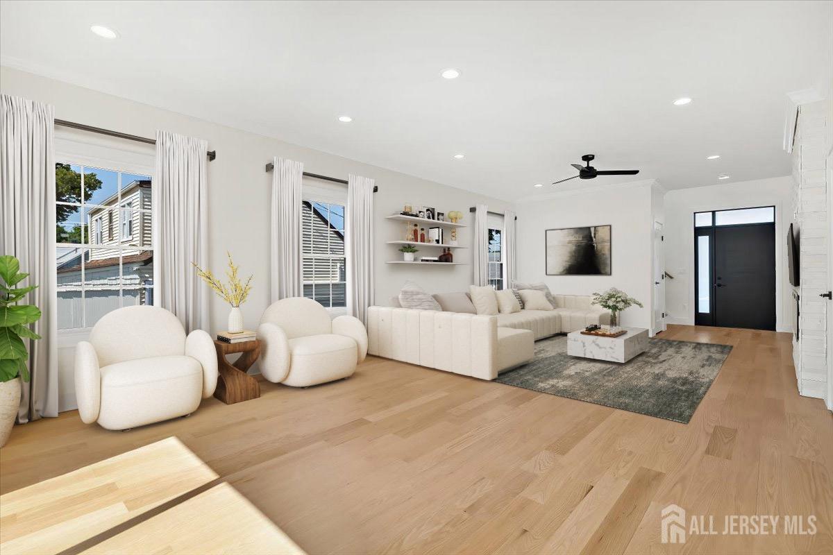 30 Ashley Road Edison, NJ 08817 - Photo 4 of 39 a living room with furniture and flat screen tv
