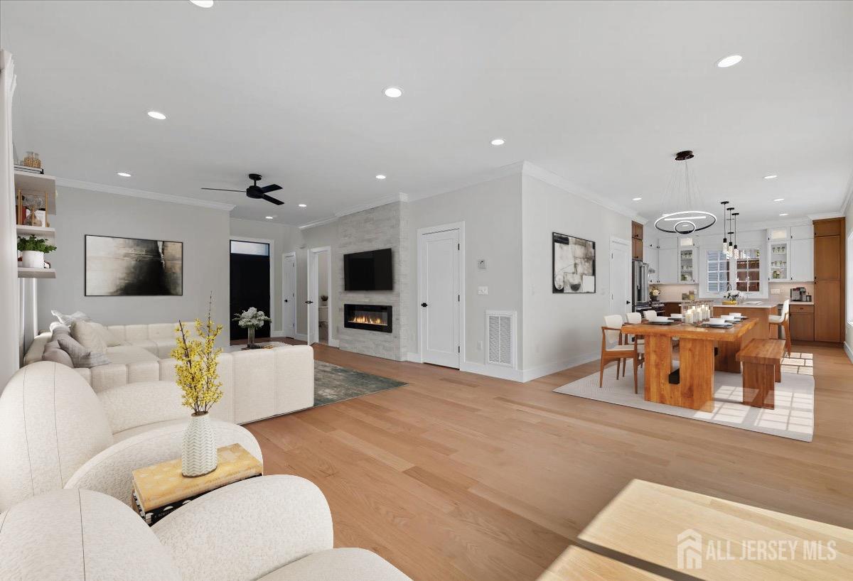 30 Ashley Road Edison, NJ 08817 - Photo 5 of 39 a living room with furniture and a flat screen tv